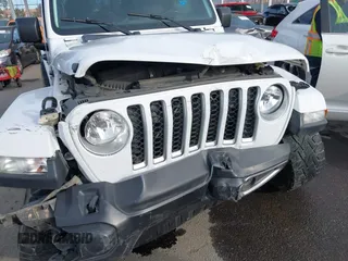 2021 Jeep Gladiator High Altitude с VIN 1C6HJTFGXML504007, выставлен на аукционе IAAI как лот 41388706 с пробегом 70 584 миль миль и . История ставок и продаж доступна на DreamBid. Изображение 6.
