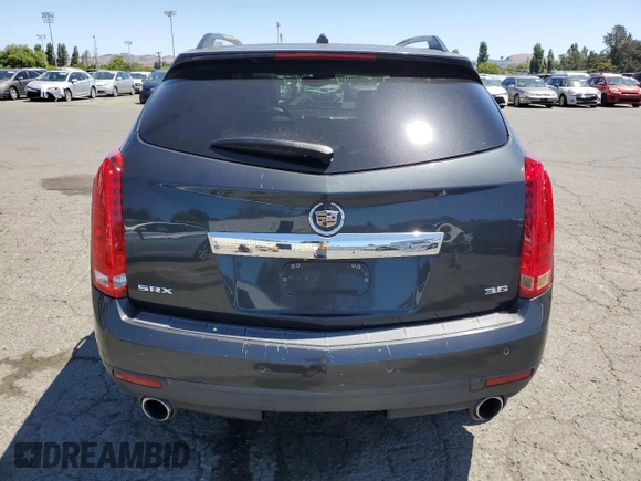 2014 Cadillac SRX Performance Collection z VIN 3GYFNCE36ES687267, wystawiony jako Copart lot #58242255 z przebiegiem 167 577 mil mil oraz Szkoda całkowita • Salvage title. Historia ofert i sprzedaży dostępna na DreamBid. Obrazek 6.