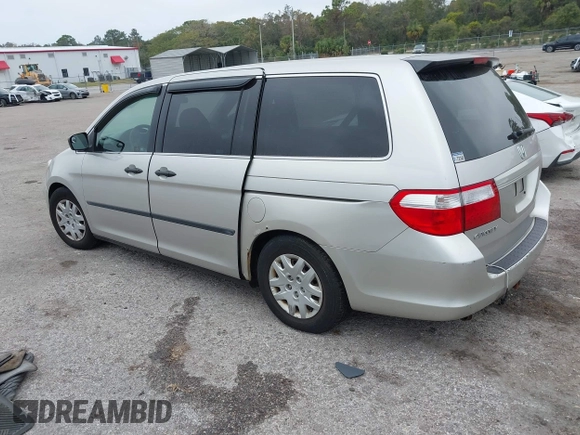 2006 Honda Odyssey LX with VIN 5FNRL38206B129663, listed as a IAAI auction lot 40978284 with 290,666 mi miles. Bid and sale history available at carsss.com. Image 3.