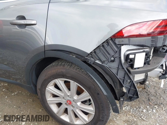 2018 Jaguar E-Pace S z VIN SADFJ2FXXJ1Z31984, wystawiony jako IAAI lot #42006201 z przebiegiem 68 909 mil mil oraz . Historia ofert i sprzedaży dostępna na DreamBid. Obrazek 6.