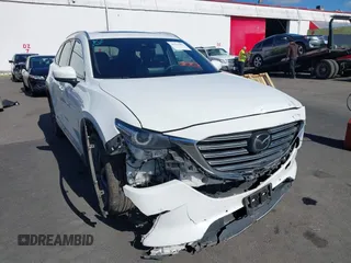 2020 Mazda CX-9 Signature with VIN JM3TCBEY3L0418322, listed as a IAAI auction lot 41723991 with 57,325 mi miles and . Bid and sale history available at carsss.com. Image 6.