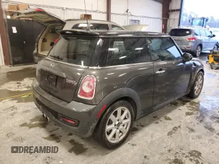 2013 MINI Hardtop S with VIN WMWSV3C53DT390693, listed as a Copart auction lot 44827925 with 131,411 mi miles and Salvage Title. Bid and sale history available at DreamBid. Image 3.