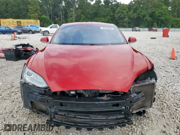 2014 Tesla Model S 60 with VIN 5YJSA1H11EFP43669, listed as a Copart auction lot 62368605 with Not provided miles and Salvage title. Bid and sale history available at DreamBid. Image 5.