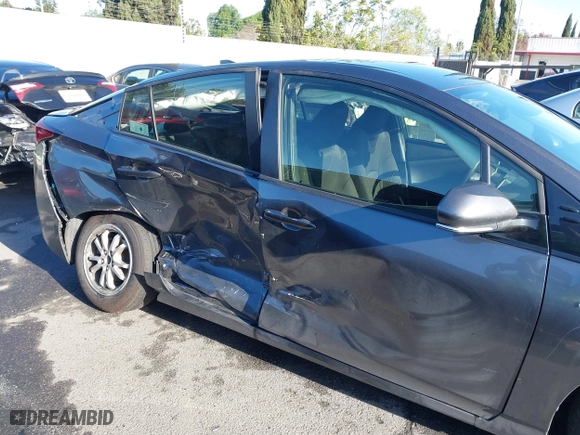 2019 Toyota Prius L Eco with VIN JTDKARFU8K3099401, listed as a IAAI auction lot 41939253 with 47,760 mi miles. Bid and sale history available at carsss.com. Image 6.