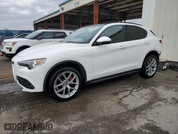 2019 Alfa Romeo Stelvio Ti with VIN ZASPAKBN2K7C58702, listed as a Copart auction lot 47459585 with 49,393 mi miles and Salvage title. Bid and sale history available at DreamBid. Image 1.