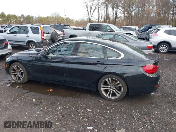 2018 BMW 4 Series 430i xDrive with VIN WBA4J3C56JBG91516, listed as a IAAI auction lot 41824273 with 102,932 mi miles and . Bid and sale history available at DreamBid. Image 14.