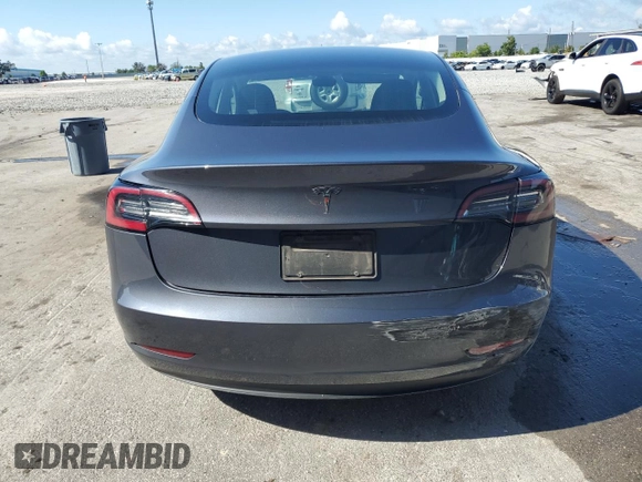 2023 Tesla Model 3 with VIN 5YJ3E1EA7PF456613, listed as a Copart auction lot 56940255 with 35,920 mi miles and Non repairable. Bid and sale history available at DreamBid. Image 6.