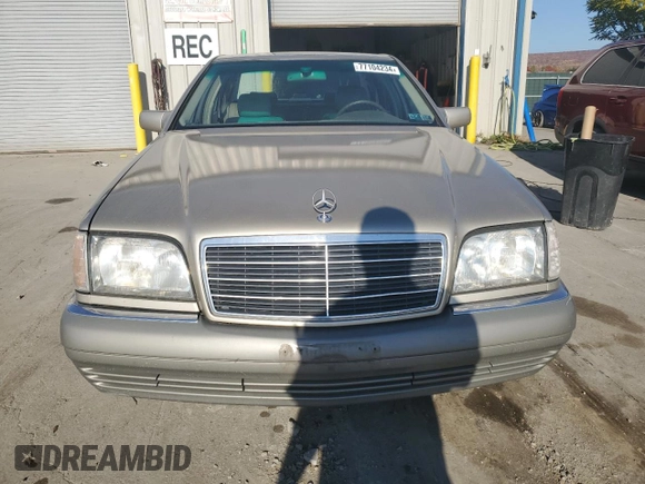 1995 Mercedes-Benz S 320 with VIN WDBGA32E6SA256435, listed as a Copart auction lot 77104234 with 309,498 mi miles and Clean Title. Bid and sale history available at DreamBid. Image 5.
