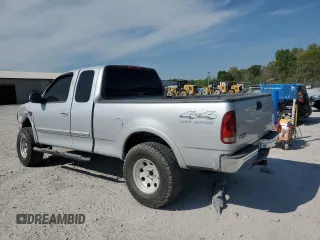 2000 Ford F-150 XL with VIN 1FTRX18L8YNB58706, listed as a Copart auction lot 53243215 with 0 mi miles and Salvage Title. Bid and sale history available at carsss.com. Image 2.