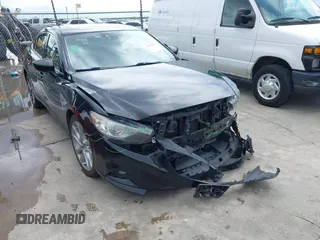 2014 Mazda 6 i Grand Touring with VIN JM1GJ1W68E1129229, listed as a IAAI auction lot 42358865 with 204,062 mi miles and . Bid and sale history available at DreamBid. Image 1.