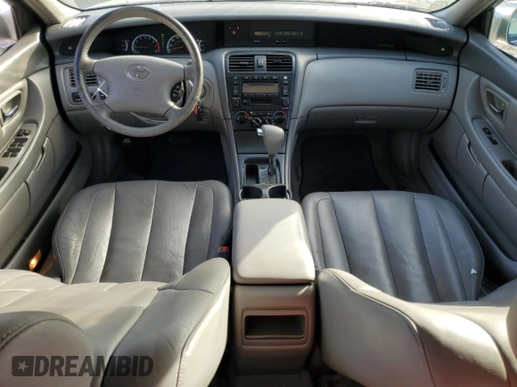2002 Toyota Avalon XL with VIN 4T1BF28B32U263941, listed as a Copart auction lot 83993504 with 118,438 mi miles and Salvage Title. Bid and sale history available at DreamBid. Image 8.