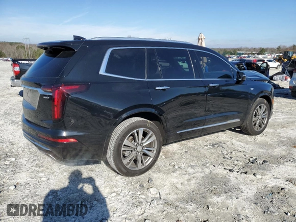 2021 Cadillac XT6 Premium Luxury z VIN 1GYKPDRS6MZ150397, wystawiony jako Copart lot #85137654 z przebiegiem 52 305 mil mil oraz Szkoda całkowita • Salvage title. Historia ofert i sprzedaży dostępna na DreamBid. Obrazek 3.