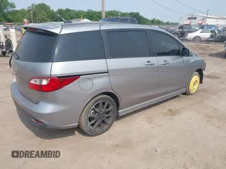 2012 Mazda 5 Touring с VIN JM1CW2CL1C0107706, выставлен на аукционе IAAI как лот 42422759 с пробегом 123 475 миль миль и . История ставок и продаж доступна на DreamBid. Изображение 4.