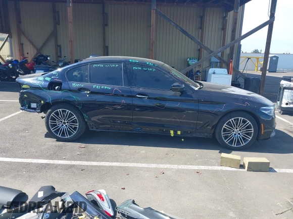 2018 BMW 5 Series 530e xDrive with VIN WBAJB1C51JB374308, listed as a IAAI auction lot 41965038 with 122,791 mi miles and . Bid and sale history available at carsss.com. Image 14.