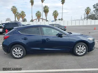 2016 Mazda Mazda3 i Grand Touring with VIN JM1BM1N74G1319656, listed as a IAAI auction lot 41561603 with 123,610 mi miles. Bid and sale history available at carsss.com. Image 13.