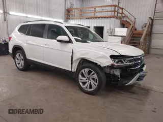 2021 Volkswagen Atlas SE z VIN 1V2HR2CA3MC539997, wystawiony jako IAAI lot #41977786 z przebiegiem 77 372 mil mil oraz . Historia ofert i sprzedaży dostępna na DreamBid. Obrazek 1.