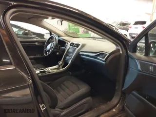 2014 Ford Fusion SE Hybrid with VIN 3FA6P0LU8ER151329, listed as a IAAI auction lot 41643515 with 121,161 mi miles. Bid and sale history available at carsss.com. Image 5.