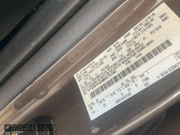 2021 Ford F-150 XL z VIN 1FTEW1C83MKE70190, wystawiony jako IAAI lot #42636470 z przebiegiem 129 638 mil mil oraz . Historia ofert i sprzedaży dostępna na DreamBid. Obrazek 1.