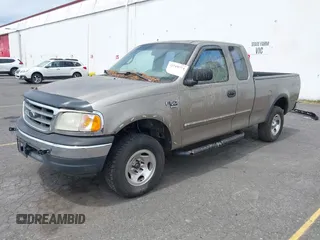 2001 Ford F-150 XL with VIN 2FTRX18W21CA32671, listed as a IAAI auction lot 42719774 with 244,348 mi miles and . Bid and sale history available at DreamBid. Image 2.