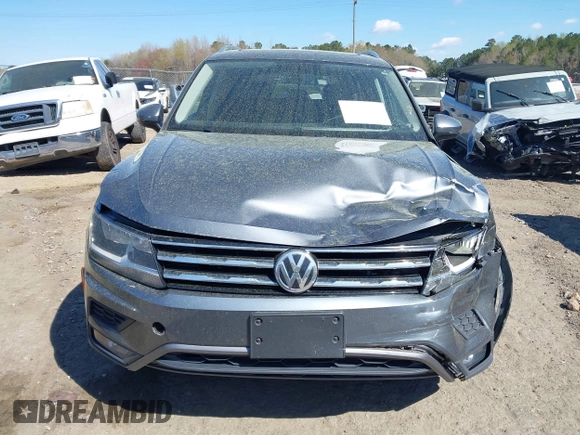 2018 Volkswagen Tiguan SEL with VIN 3VV3B7AX5JM036164, listed as a IAAI auction lot 41876403 with 108,269 mi miles and . Bid and sale history available at DreamBid. Image 12.