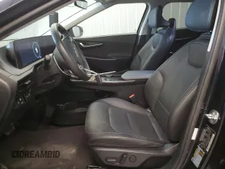 2023 Kia EV6 Wind with VIN KNDC34LA5P5610876, listed as a Copart auction lot 76553374 with 52,206 mi miles and Clean Title. Bid and sale history available at carsss.com. Image 7.