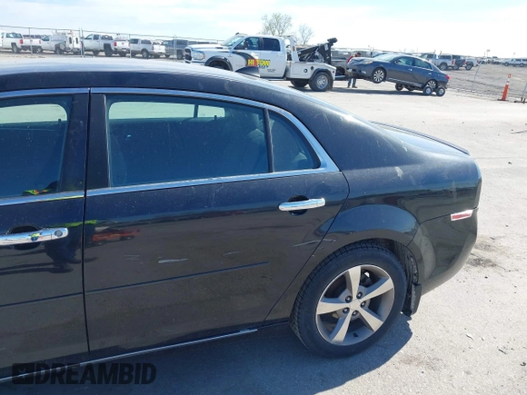 2012 Chevrolet Malibu 1LT with VIN 1G1ZC5E01CF198330, listed as a IAAI auction lot 42140421 with 119,740 mi miles and . Bid and sale history available at DreamBid. Image 13.