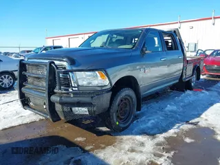 2010 Dodge 2500 SLT with VIN 3D7UT2CL8AG149365, listed as a IAAI auction lot 41290754 with 100,065 mi miles and . Bid and sale history available at DreamBid. Image 2.