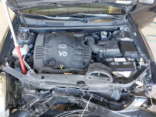 2007 Kia Optima EX with VIN KNAGE124875134352, listed as a IAAI auction lot 41627381 with 183,053 mi miles. Bid and sale history available at carsss.com. Image 10.