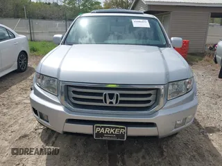 2014 Honda Ridgeline RTL with VIN 5FPYK1F53EB013752, listed as a IAAI auction lot 41886851 with 89,038 mi miles and . Bid and sale history available at DreamBid. Image 6.