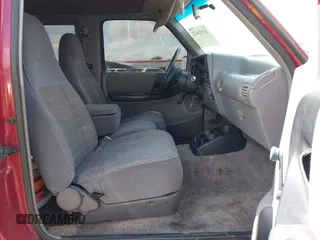 1994 Ford Ranger Splash z VIN 1FTCR15X3RPB69674, wystawiony jako IAAI lot #41931622 z przebiegiem 144 828 mil mil oraz . Historia ofert i sprzedaży dostępna na DreamBid. Obrazek 5.