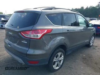 2013 Ford Escape SE z VIN 1FMCU0GX0DUD90385, wystawiony jako IAAI lot #42557540 z przebiegiem 147 529 mil mil oraz . Historia ofert i sprzedaży dostępna na DreamBid. Obrazek 4.