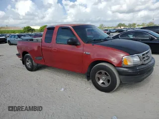 2000 Ford F-150 XL with VIN 2FTZX0724YCA62788, listed as a Copart auction lot 60301585 with Not provided miles and Clean title. Bid and sale history available at DreamBid. Image 4.