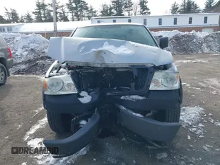 2007 Ford F-150 XL with VIN 1FTRF12W67NA40142, listed as a IAAI auction lot 41617797 with 216,585 mi miles. Bid and sale history available at carsss.com. Image 6.