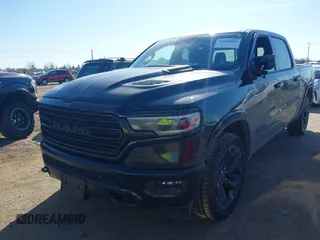 2023 Ram 1500 Limited with VIN 1C6SRFHT5PN542859, listed as a IAAI auction lot 41669646 with 80,045 mi miles and . Bid and sale history available at DreamBid. Image 2.