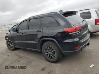 2017 Jeep Grand Cherokee Trailhawk with VIN 1C4RJFLT5HC692439, listed as a Copart auction lot 81093534 with 135,493 mi miles and Salvage title. Bid and sale history available at DreamBid. Image 2.