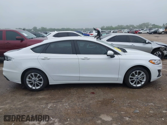 2020 Ford Fusion SE with VIN 3FA6P0LU2LR266943, listed as a IAAI auction lot 42160987 with 61,435 mi miles and . Bid and sale history available at DreamBid. Image 14.