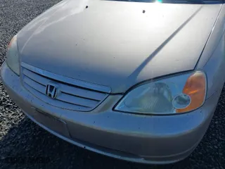 2003 Honda Civic EX with VIN 2HGES26793H548855, listed as a IAAI auction lot 41777707 with 169,783 mi miles. Bid and sale history available at carsss.com. Image 6.