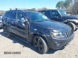 2014 Jeep Grand Cherokee Laredo with VIN 1C4RJEAG0EC580675, listed as a IAAI auction lot 41773879 with 127,714 mi miles. Bid and sale history available at carsss.com. Image 1.