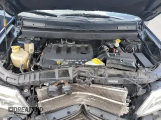 2013 Dodge Journey SE with VIN 3C4PDCAB7DT680055, listed as a Copart auction lot 58241435 with 199,620 mi miles and Salvage title. Bid and sale history available at DreamBid. Image 12.