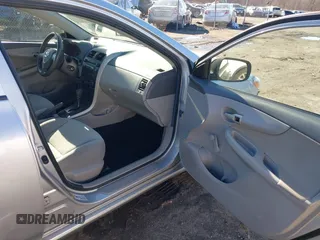 2009 Toyota Corolla with VIN 2T1BU40E49C155993, listed as a IAAI auction lot 41588637 with 183,548 mi miles. Bid and sale history available at carsss.com. Image 5.