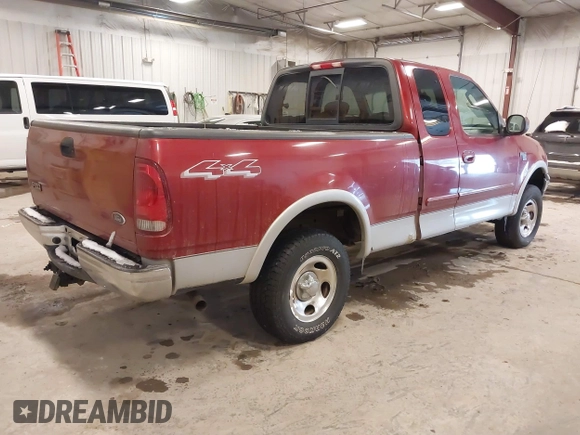 2003 Ford F-150 XL with VIN 1FTRX18L33NB82694, listed as a IAAI auction lot 41612431 with 179,664 mi miles. Bid and sale history available at carsss.com. Image 4.