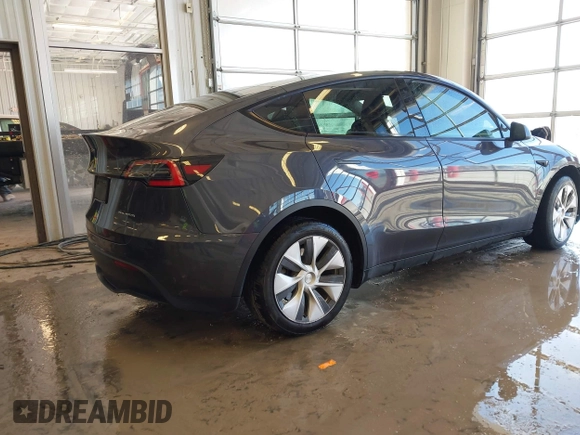 2021 Tesla Model Y Long Range with VIN 5YJYGDEE2MF087871, listed as a IAAI auction lot 41370004 with 85,757 mi miles. Bid and sale history available at carsss.com. Image 4.