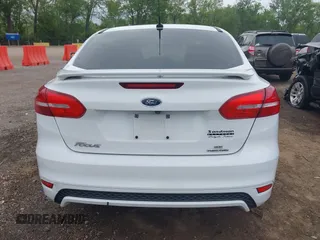 2016 Ford Focus SE with VIN 1FADP3F21GL288553, listed as a IAAI auction lot 42253117 with 107,727 mi miles and . Bid and sale history available at DreamBid. Image 17.