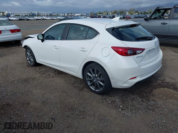 2018 Mazda 3 Touring with VIN 3MZBN1L31JM225108, listed as a IAAI auction lot 41959304 with 74,933 mi miles. Bid and sale history available at carsss.com. Image 3.