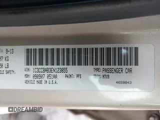 2014 Chrysler 200 LX with VIN 1C3CCBAB3EN123855, listed as a IAAI auction lot 41573962 with 146,495 mi miles and . Bid and sale history available at carsss.com. Image 9.