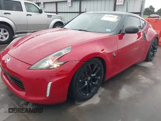 2016 Nissan 370Z z VIN JN1AZ4EHXGM932681, wystawiony jako IAAI lot #42350850 z przebiegiem 94 586 mil mil oraz . Historia ofert i sprzedaży dostępna na DreamBid. Obrazek 17.