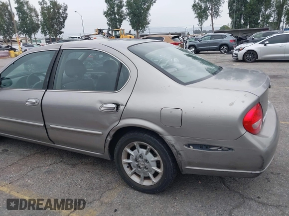 2000 Nissan Maxima GXE z VIN JN1CA31D0YT754624, wystawiony jako IAAI lot #42299290 z przebiegiem 81 958 mil mil oraz . Historia ofert i sprzedaży dostępna na DreamBid. Obrazek 6.