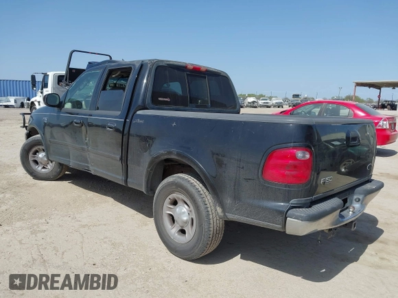 2003 Ford F-150 XLT with VIN 1FTRW07L53KC01651, listed as a IAAI auction lot 41827007 with 233,842 mi miles and . Bid and sale history available at DreamBid. Image 3.