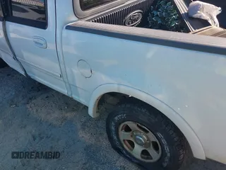 2002 Ford F-150 XLT with VIN 1FTRW08612KD90354, listed as a IAAI auction lot 41308528 with 207,261 mi miles. Bid and sale history available at carsss.com. Image 14.
