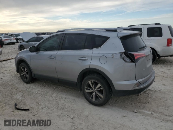 2018 Toyota RAV4 XLE with VIN JTMWFREV3JJ180152, listed as a Copart auction lot 46949465 with 103,346 mi miles and Clean Title. Bid and sale history available at DreamBid. Image 2.